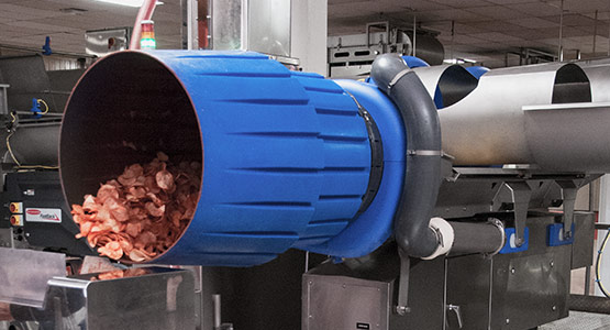 On-machine seasoning system for snack foods