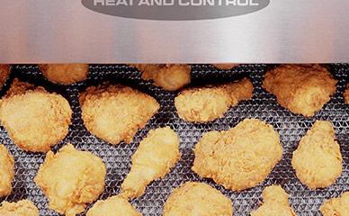 Continuous and batch fryers for meat, chicken and seafood
