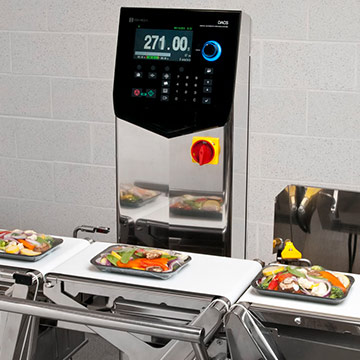 Check weighing packaged vegetables