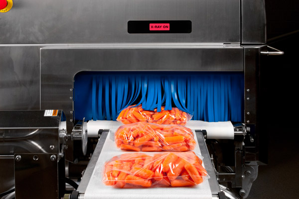 Carrots being inspected by X-ray