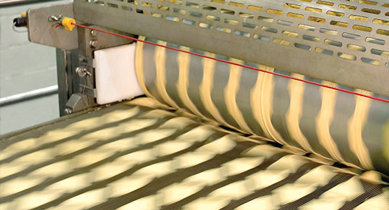 Sheeting equipment for tortilla chips, tortillas, and corn products