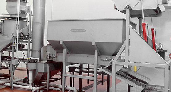 Metering potatoes to Vertical Screw Elevator