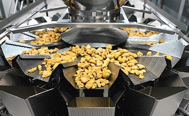 Ishida multihead weighing for chicken nuggets and prepared foods