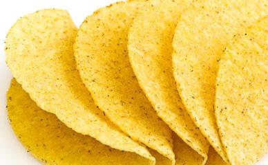 Fried taco shells and formed corn products