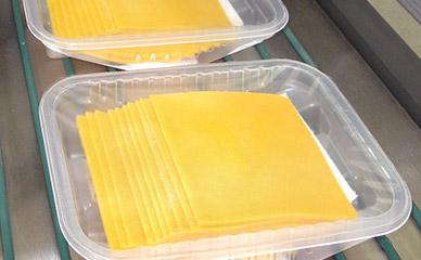 Filling sliced cheese trays