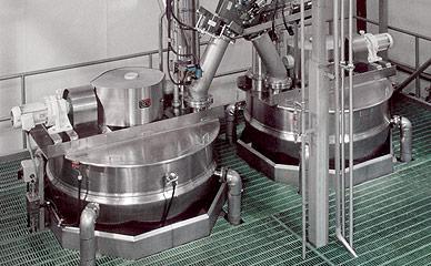 Corn cooking and soaking equipment for corn chips production