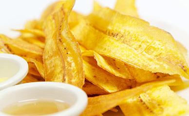 Frying systems for plantain and banana chips lines