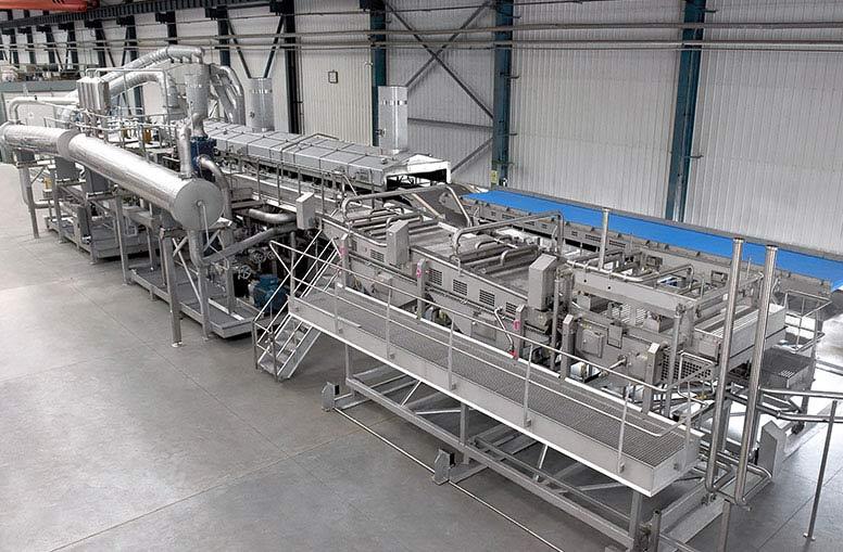 Sistema personalizado de producción de papas fritas a la francesa sale de la planta de fabricación de Heat and Control